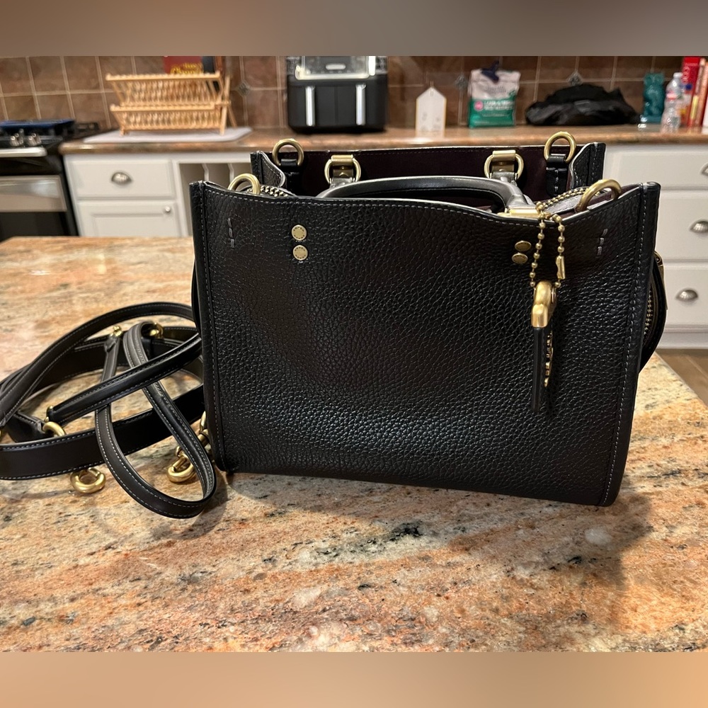 Coach Rogue 25 in Black with Oxblood Lining